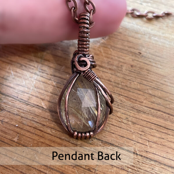 Faceted Rutilated Quartz Crystal in Woven Copper Wire Pendant (1)