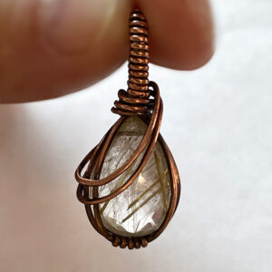 Faceted Rutilated Quartz Crystal in Woven Copper Wire Pendant (1)