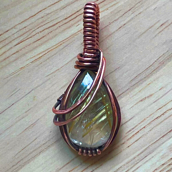 Faceted Rutilated Quartz Crystal in Woven Copper Wire Pendant (1)