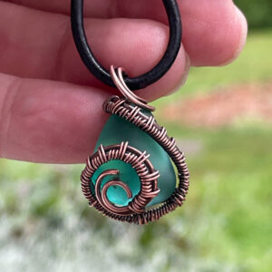 Pendant - Green Sea Glass wrapped with woven copper wire