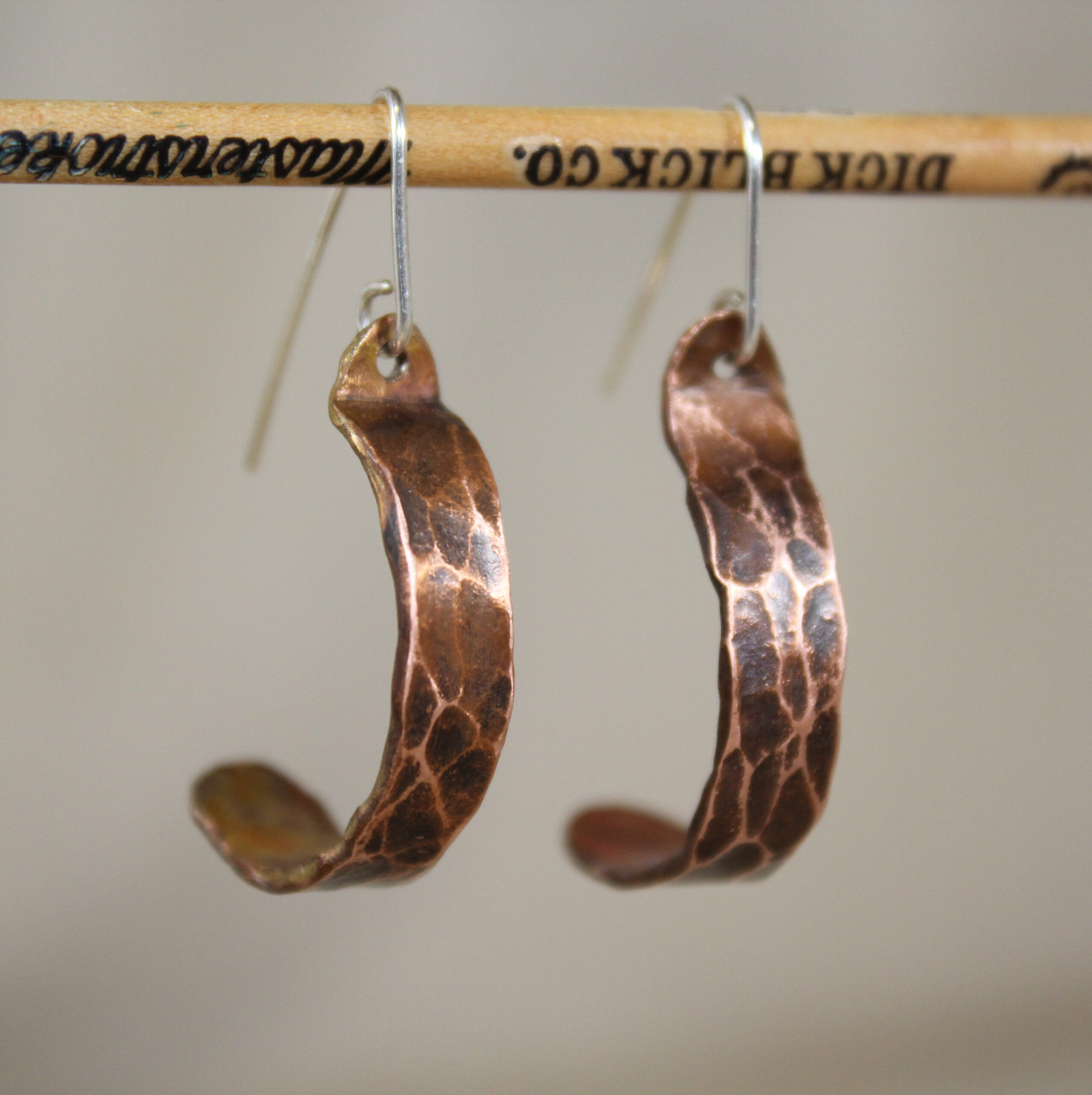hammered copper half hoop earrings