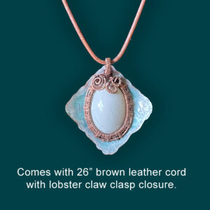 Pendant-A White Howlite cabochon wrapped with woven copper wire in a hammered copper frame