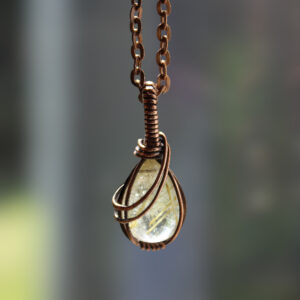 Faceted Rutilated Quartz Crystal in Woven Copper Wire Pendant (1)